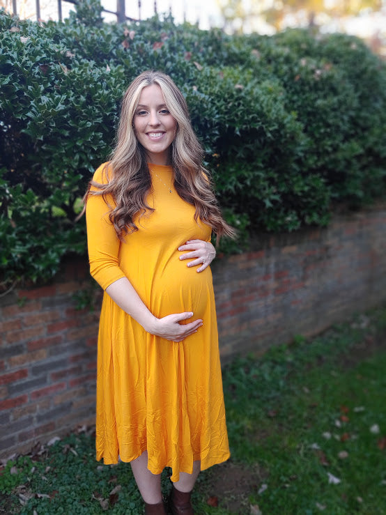 Maternity midi-length swing dress