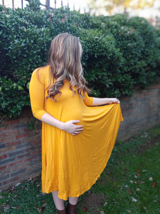 Maternity midi-length swing dress