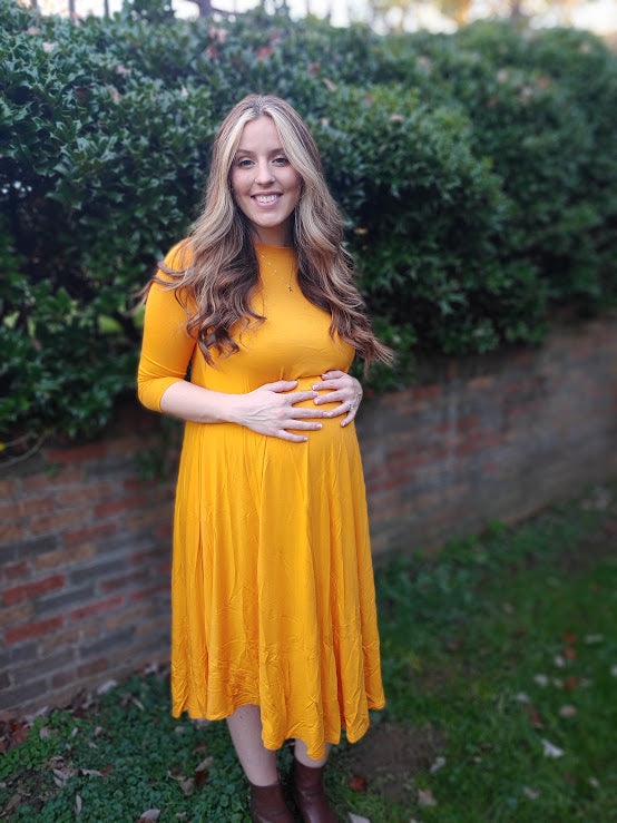 Maternity midi-length swing dress